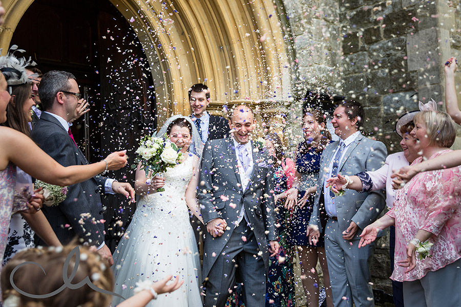 newlyweds are showered with confetti at Christ Church Southgate London