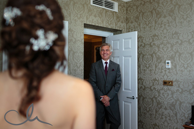 Brides father sees his daughter for the first time in her wedding dress
