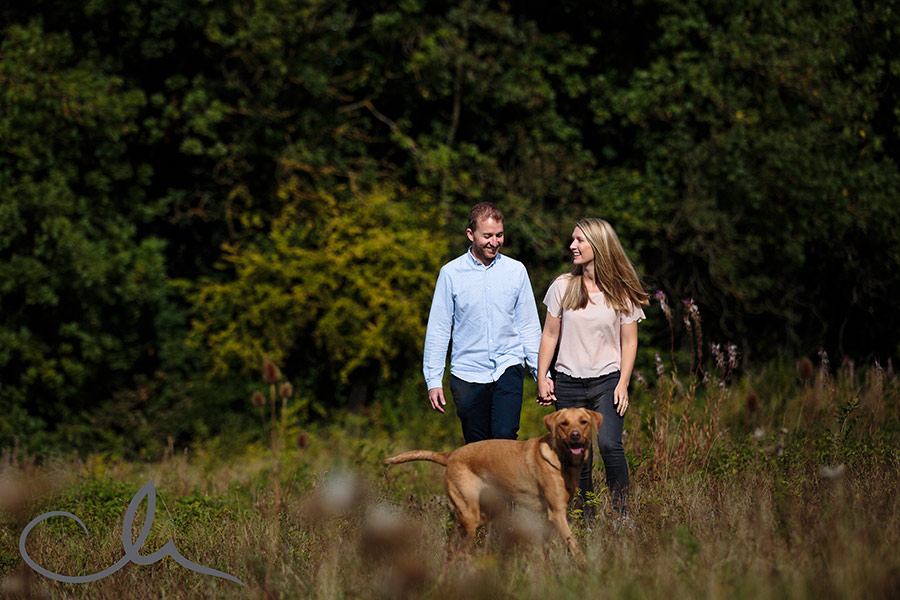 couple have a romantic stroll in the kent countryside