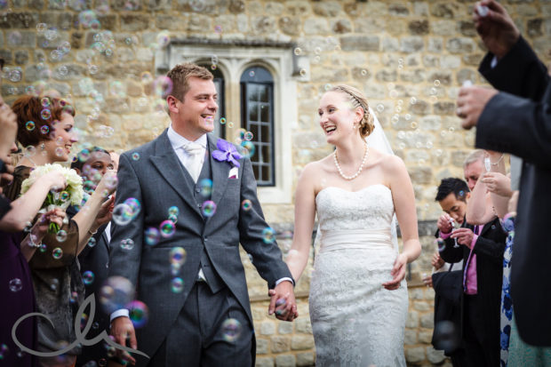 newlywed couple are showered with bubbles at Leeds Castle