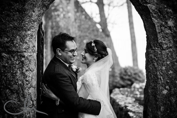 newlywed couple have their portraits photographed at Lympne Castle