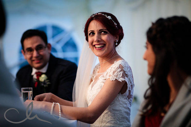 Bride reacts to speehes at Lympne Castle Wedding