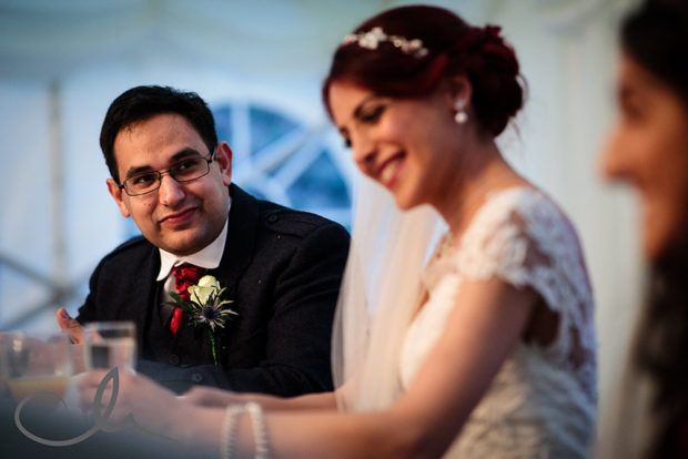 Groom reacts to speehes at Lympne Castle Wedding