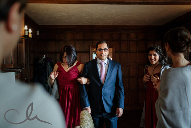 brides brother practices his walk down the isle for his sisters wedding