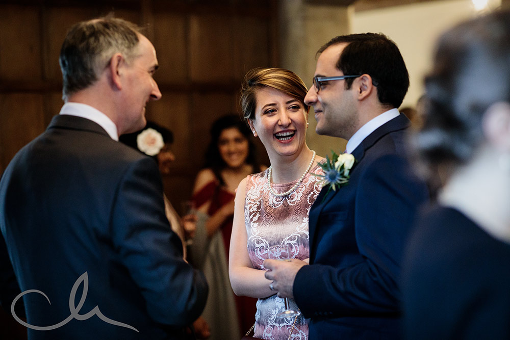 guests have a happy time at Lympne Castle wedding reception