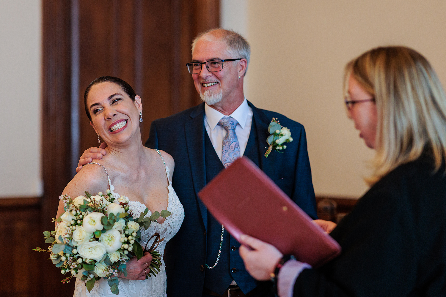 Steve and Berenice look so happy during their wedding ceremony at The Old Magistrates Court, Jersey CI