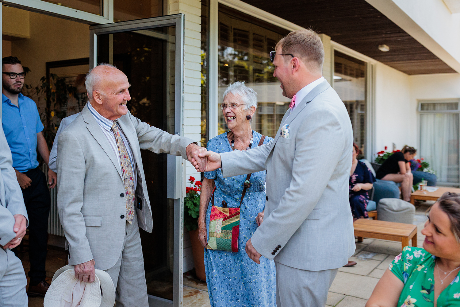 The groom greets his guests at The Atlantic Hotel, Jersey ahead of his marriage to his sweetheart